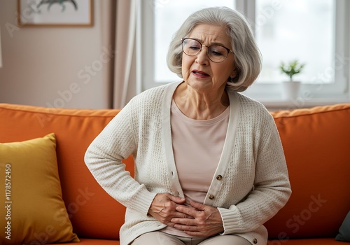 Elderly senior woman stomach ache so pain illness, food poisoning in patient have a bacteria infection, Unhappy elderly painful on stomach vomit and tried need medicine and rest, Elderly Health  photo