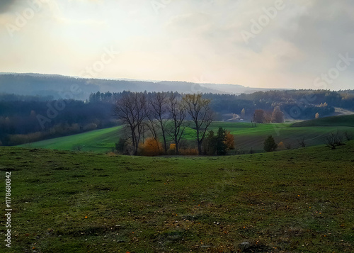 Green fields, hills and meadows. Landscape of Kashubia in autumn. photo