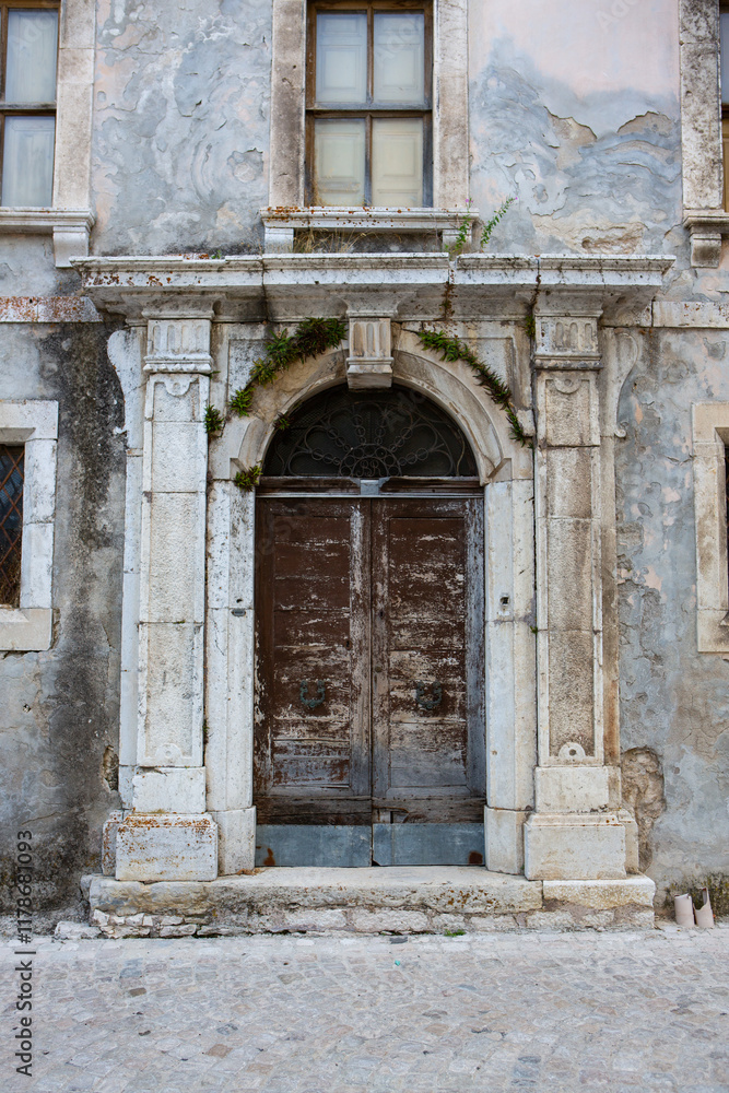 Historic wooden door with intricate details, showcasing timeless architecture and craftsmanship, perfect for vintage design and cultural heritage enthusiasts Historic wooden door with intricate details, showcasing timeless architecture and craftsmanship, perfect for vintage design and cultural heritage enthusiasts