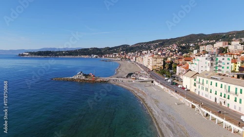 Wallpaper Mural Stunning aerial footage of Varazze, Italy, showcasing its beautiful coastline, crystal-clear waters, and charming Mediterranean town. Ascending tilt don shot Torontodigital.ca