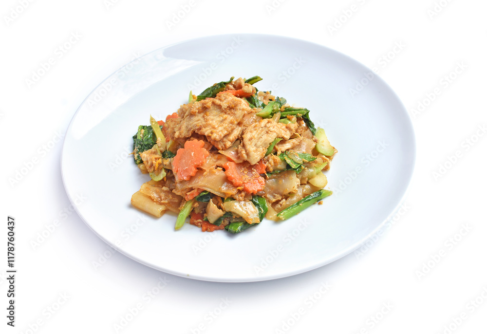 Stir-fried rice noodle with black soy sauce on white plate Stir-fried rice noodle with black soy sauce on white plate