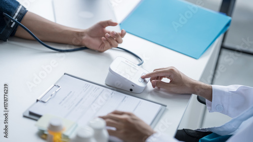 Medical Examination Doctor Conducting Blood Pressure Test on Patient for Diagnosisใ photo