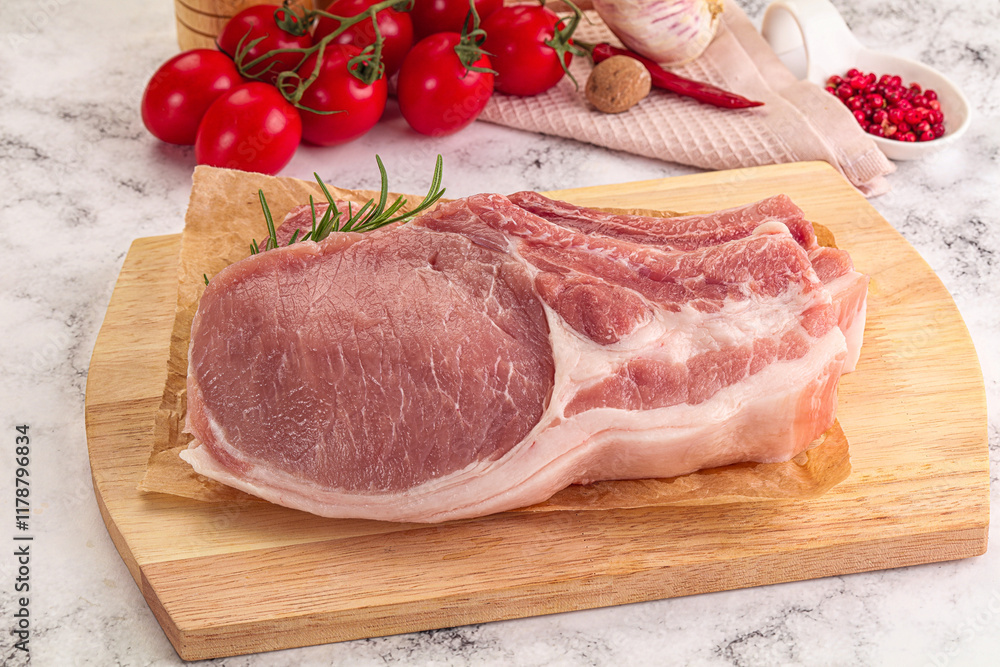 Raw potk loin steak with bone Raw potk loin steak with bone