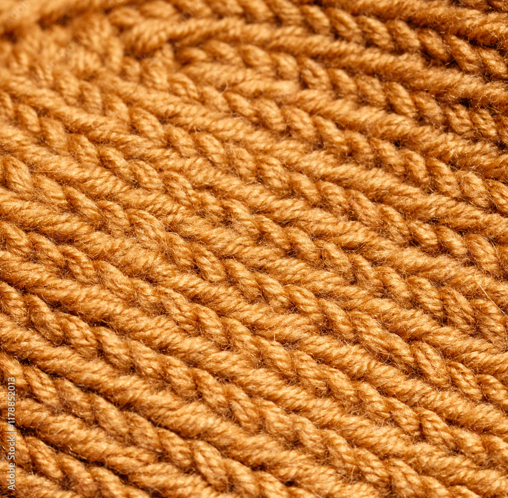 A close up of a knitted item with a brown color A close up of a knitted item with a brown color
