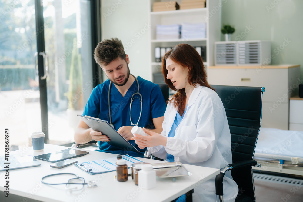 Doctors analyzing results or diagnosis of patient in clinic. Teamwork, medical and healthcare workers Doctors analyzing results or diagnosis of patient in clinic. Teamwork, medical and healthcare workers
