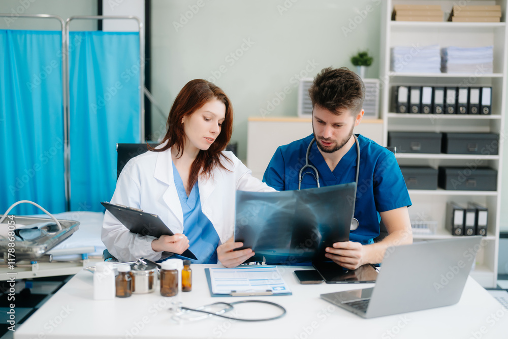 Doctors analyzing results or diagnosis of patient in clinic. Teamwork, medical and healthcare workers Doctors analyzing results or diagnosis of patient in clinic. Teamwork, medical and healthcare workers
