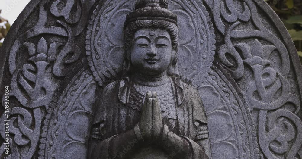A religious stone statue of Bodhisattva Samantabhadra at Japanese buddhism temple A religious stone statue of Bodhisattva Samantabhadra at Japanese buddhism temple