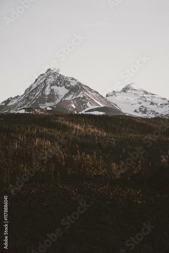 Snow-Capped Peaks of the Sisters Mountain Range in Oregon photo