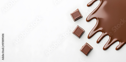 Melted dark chocolate dripping and flowing down from the top, isolated on white background photo