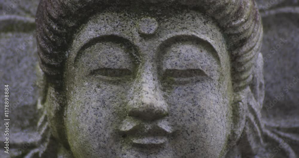 A religious stone statue of Mahasthamaprapta at Japanese buddhism temple A religious stone statue of Mahasthamaprapta at Japanese buddhism temple