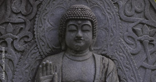 Wallpaper Mural A religious stone statue of Shaka Nyorai at Japanese buddhism temple Torontodigital.ca