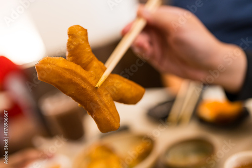 Fresh Patongo, a popular Thai breakfast food made from deep fried dough sticks photo