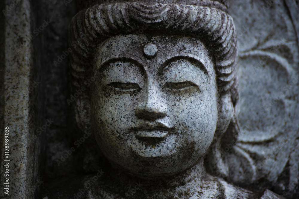 A religious stone statue of Akasagarbha at Japanese buddhism temple A religious stone statue of Akasagarbha at Japanese buddhism temple