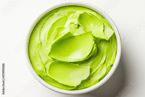 Bright Green Creamy Substance in White Bowl photo