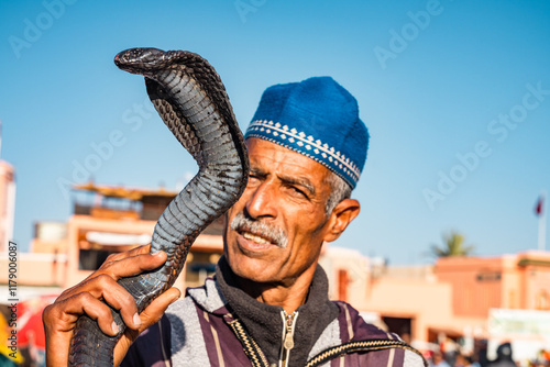 Snake charmer with cobra snake in Marrakesh, Morocco