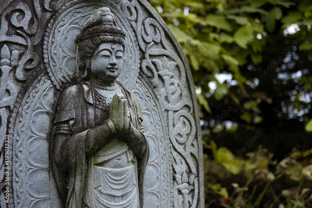 A religious stone statue of Bodhisattva Samantabhadra at Japanese buddhism temple A religious stone statue of Bodhisattva Samantabhadra at Japanese buddhism temple