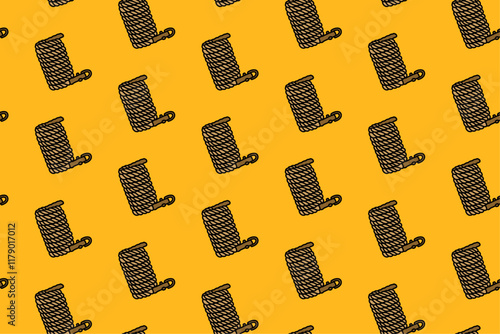 hank of rope with steel hanger colorful doodle seamless pattern on yellow background. retro skein of cord background. hank of rope pattern wallpaper. pattern background with kernmantle for adventure