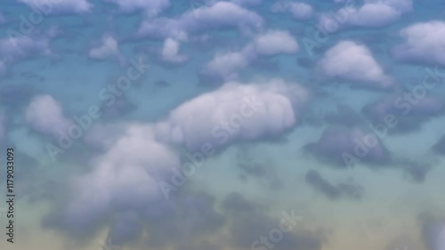 This is a video of white puffy clouds flowing by.