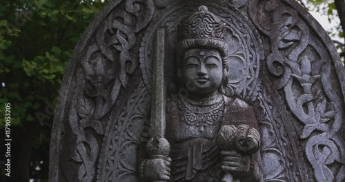 Wallpaper Mural A religious stone statue of Akasagarbha at Japanese buddhism temple Torontodigital.ca