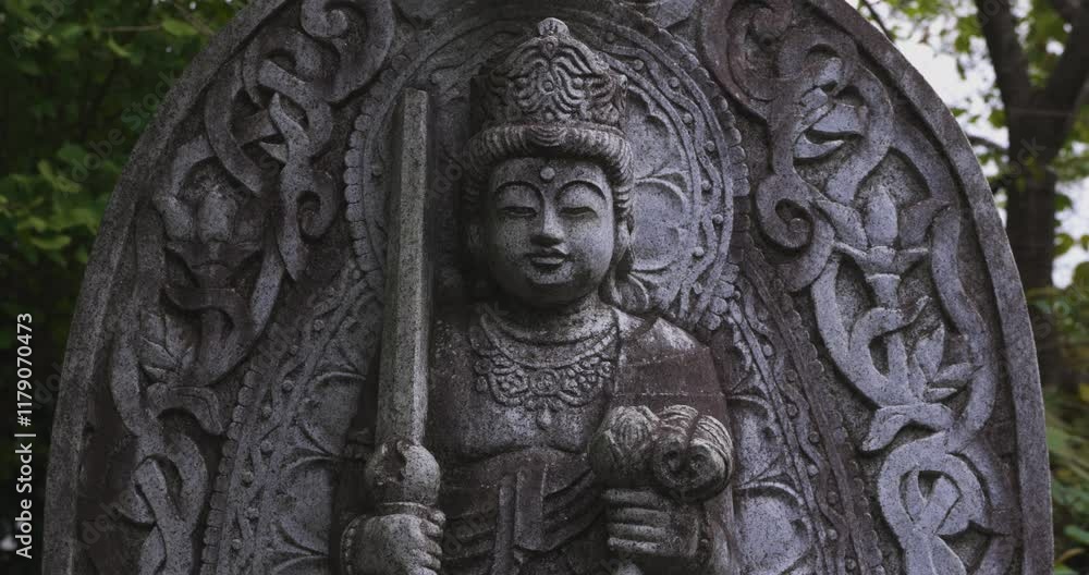 A religious stone statue of Akasagarbha at Japanese buddhism temple A religious stone statue of Akasagarbha at Japanese buddhism temple