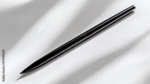 Wallpaper Mural Minimalist black pen on white surface, casting shadows Torontodigital.ca