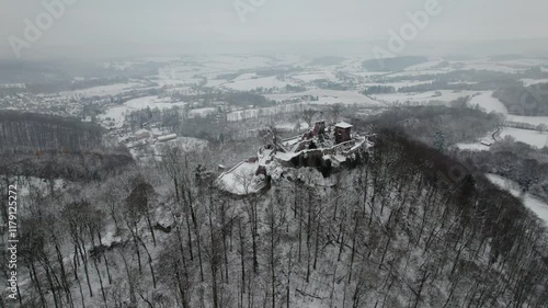 Aerial view ruins of old castle. Winter. Ruin of Hohnstein Castle, Harz mountains, Germany.