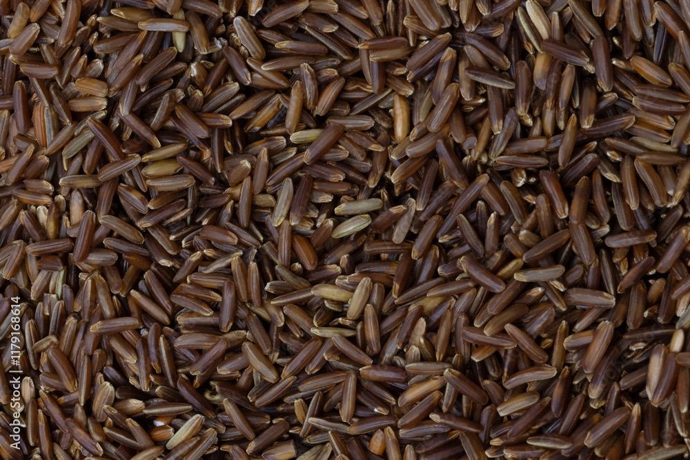 Background of red rice in close-up Background of red rice in close-up