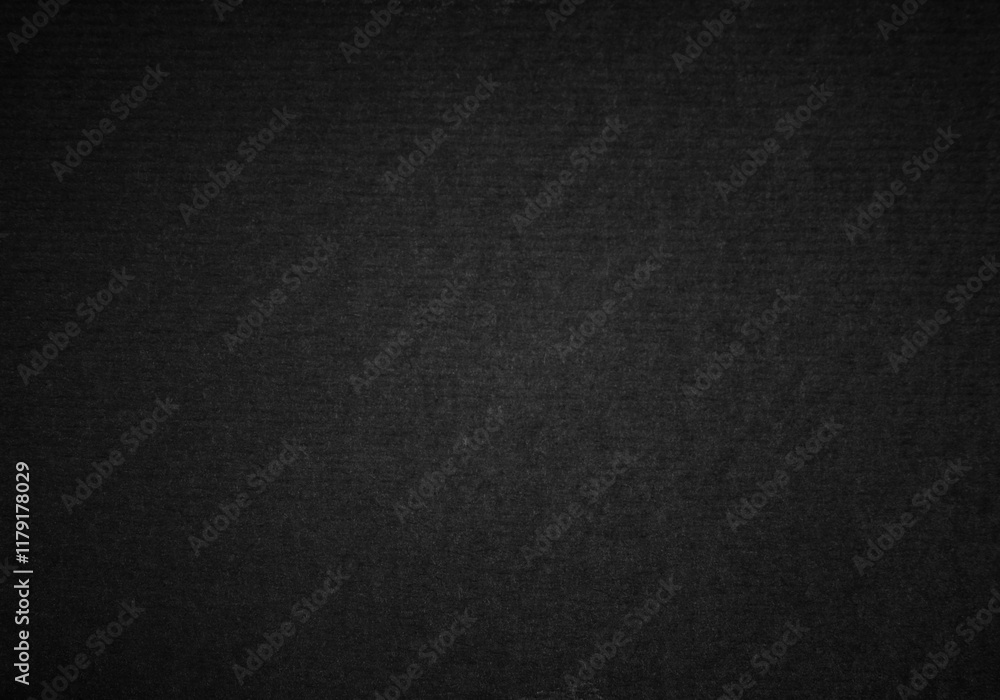 Black corrugated paper or cardboard texture as background Black corrugated paper or cardboard texture as background