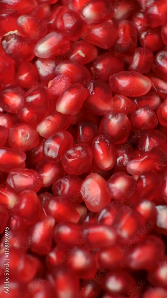 Vertical macro rotation of pomegranate seeds Vertical macro rotation of pomegranate seeds