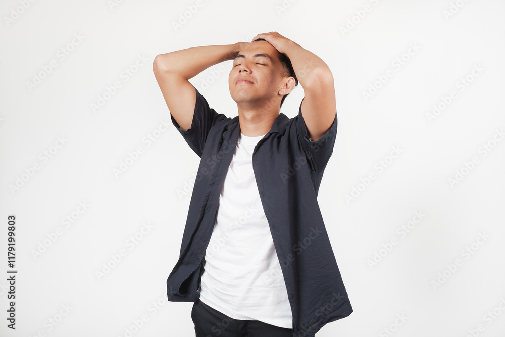 Shocked and disappoint face of asian man in grey shirt isolated on white Shocked and disappoint face of asian man in grey shirt isolated on white