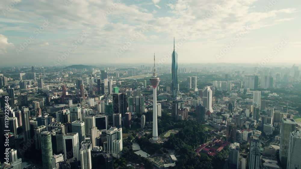 Kuala Lumpur telecommunication tower with mega tall famous skyscraper Merdeka 118 on the right, Southeast Asia, Panoramic drone view Kuala Lumpur telecommunication tower with mega tall famous skyscraper Merdeka 118 on the right, Southeast Asia, Panoramic drone view