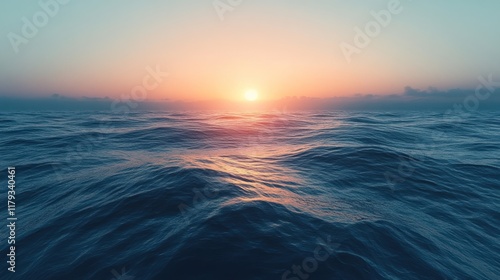 Serene ocean view at sunset, showcasing calm waves and a vibrant sky.