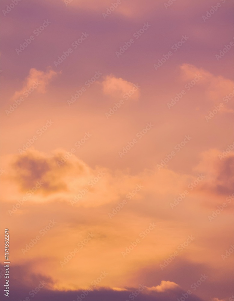 Fototapeta premium Serene Sunset Sky: A Canvas of Orange and Purple Hues