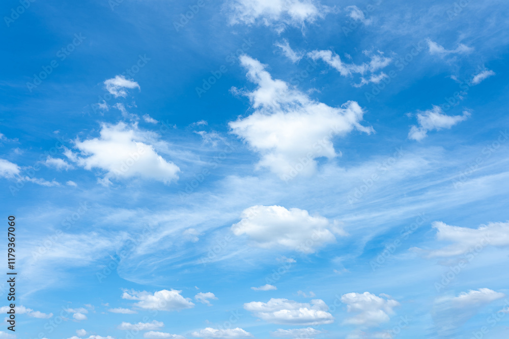 Stunning Blue Sky with Fluffy White Clouds and Cirrus Wisps Nature Background Stunning Blue Sky with Fluffy White Clouds and Cirrus Wisps Nature Background