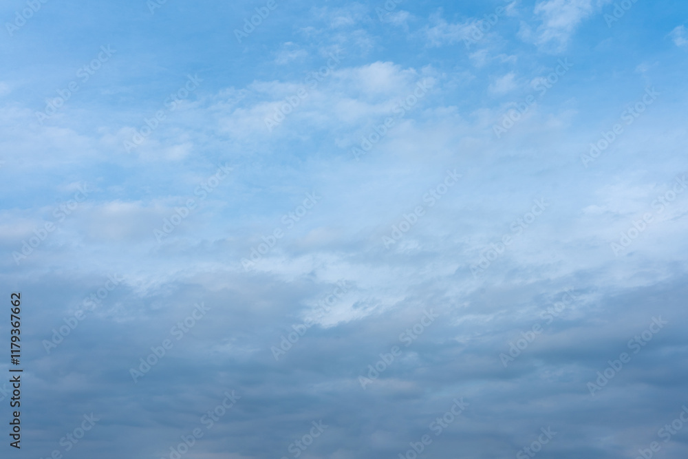 Serene Blue Sky with Soft Scattered Cloudscape Natural Weather Background Image Serene Blue Sky with Soft Scattered Cloudscape Natural Weather Background Image