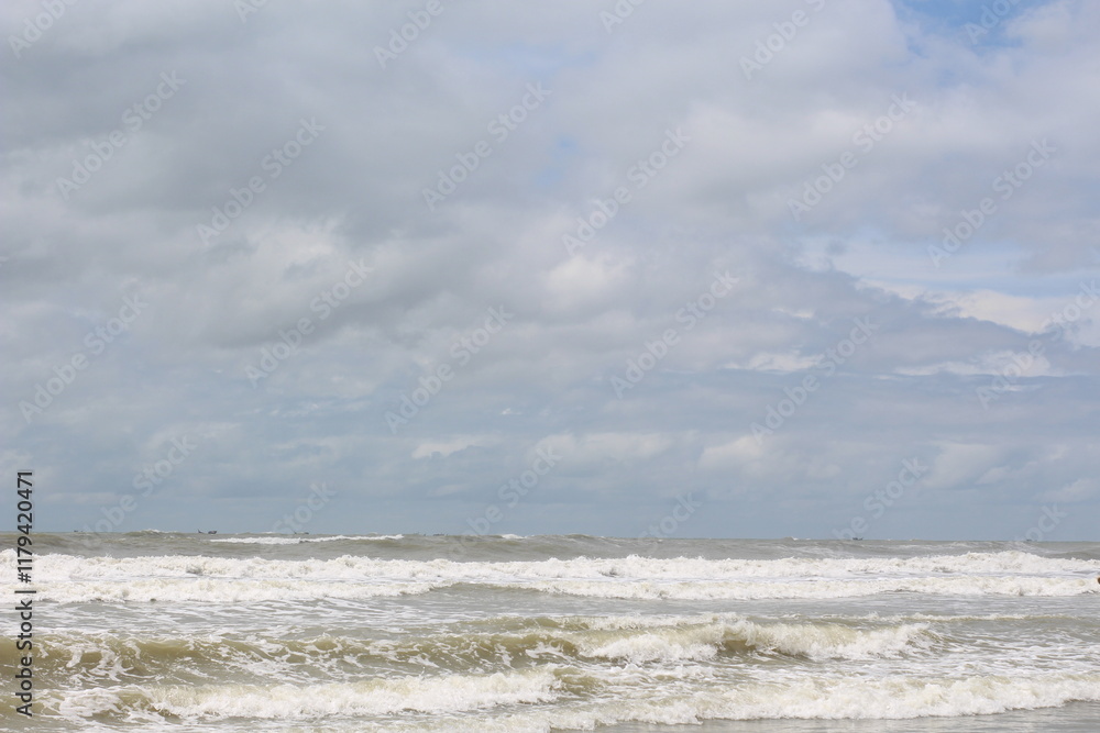 Fototapeta premium Baltic sea under the dark dramatic clouds after thunderstorm. Epic seascape. Cyclone, gale, storm, rough weather, meteorology, ecology, climate change, natural phenomenon. Grand Cayman island summer.