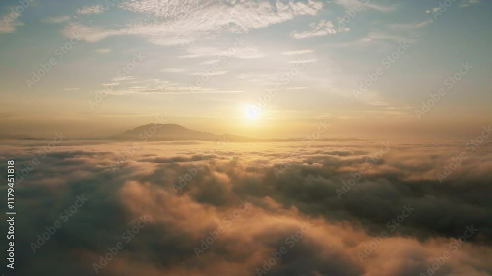 Amazing sea of fog move flowing over mountains, Sunrise sky,Aerial view Drone flies over clouds, Rainforest Clouds and fog in sunrise light, Nature and travel background concept Amazing sea of fog move flowing over mountains, Sunrise sky,Aerial view Drone flies over clouds, Rainforest Clouds and fog in sunrise light, Nature and travel background concept