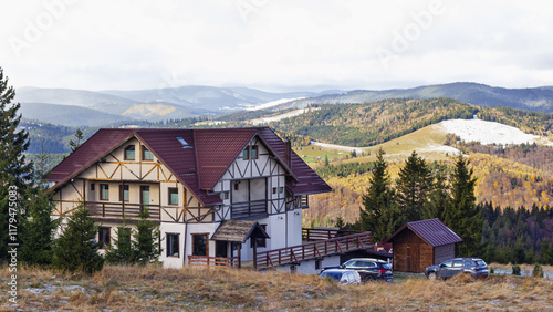 Bild auf Leinwand Snow-covered Carpathian mountains and cloudy sky in Transylvania, a region in central Romania