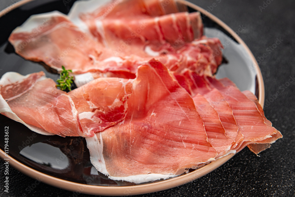 Jamon meat iberico or serrano snack aperitif fresh tasty food dish delicious gourmet food background on the table rustic food top view copy space