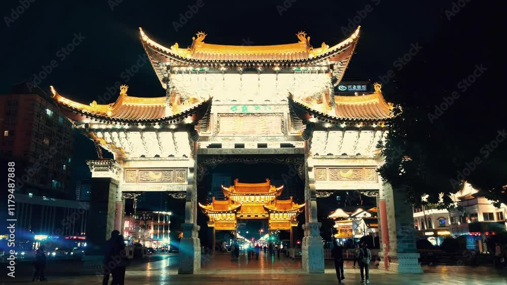Experience the stunning night view of Kunming Golden Rooster and Jade Horse Archway with mesmerizing time lapse Experience the stunning night view of Kunming Golden Rooster and Jade Horse Archway with mesmerizing time lapse