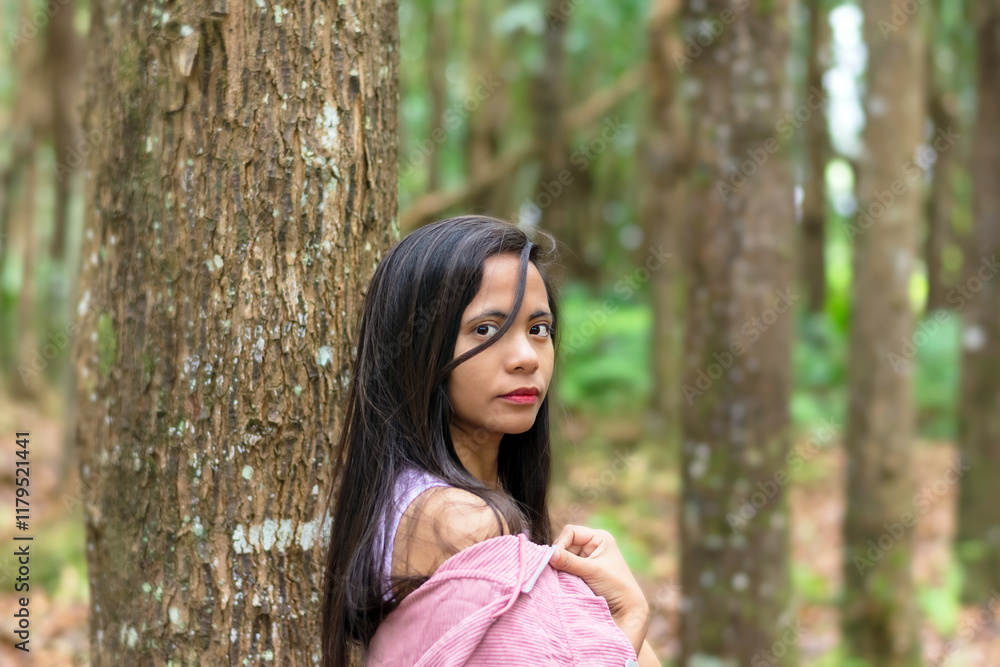 portrait of a beautiful young Filipina close-up in the forest portrait of a beautiful young Filipina close-up in the forest