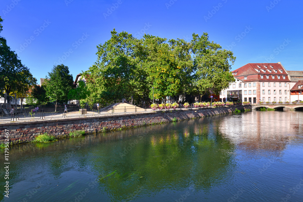 Strasbourg, France - September 2023: River 'III' in historical city center 'Petite France' Strasbourg, France - September 2023: River 'III' in historical city center 'Petite France'