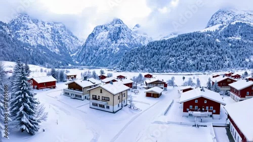 Winter Wonderland: Aerial View of a Nordic Village in Snow