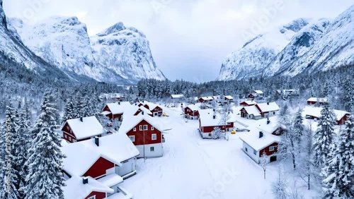 Winter Wonderland: Aerial View of a Nordic Village in Snow