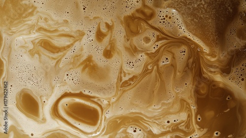 Coffee foam texture, swirling patterns, close-up. Food background.