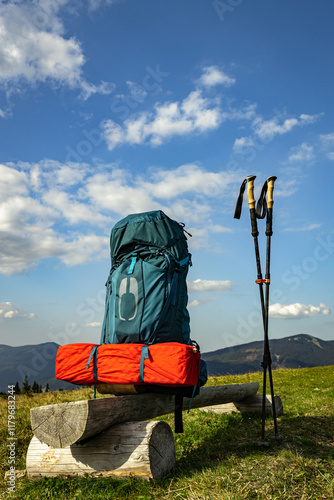 Hiking in the mountains in summer with a backpack and a tent. Beautiful landscape in the mountains.