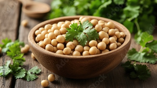 Bolivian coriander with soybeans in a wooden bowl on rustic table surrounded by fresh herbs and plants in a vibrant culinary setting. photo