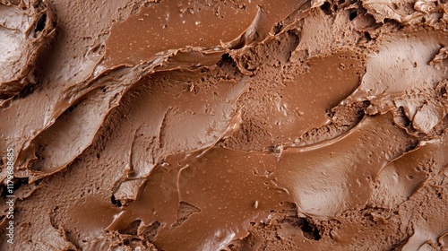 Smooth and creamy chocolate gelato swirls captured in delicious detail for dessert lovers. Mocha Mousse trend color 2025 photo