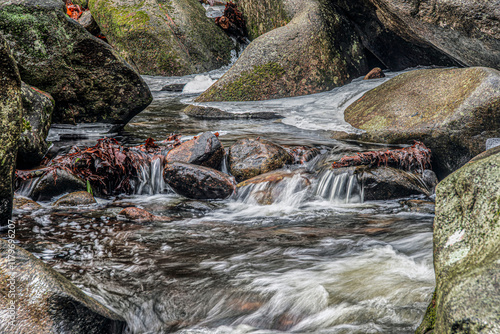   water flowing  through the rock at trap falls brook photo