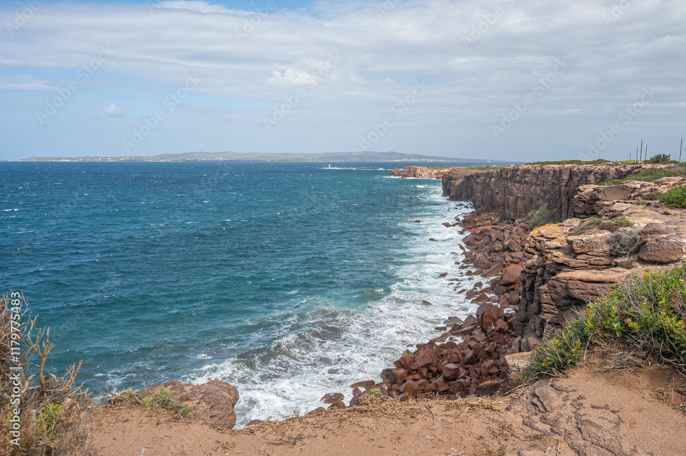 The beautiful high red cliffs of Macorì on the island of Sant'Antioco in Sardinia